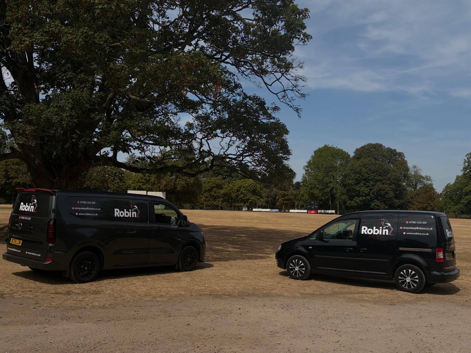 Robinz Electrical branded vans at Knebworth Park Cricket Club